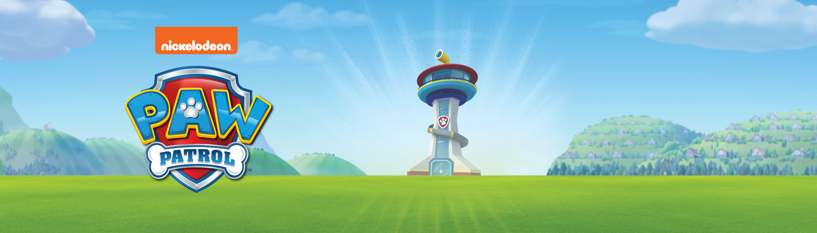 Et banner med teksten "nickelodeon. Paw Patrol" samt Paw Patrols hovedkvarter, der står midt i et naturområde.